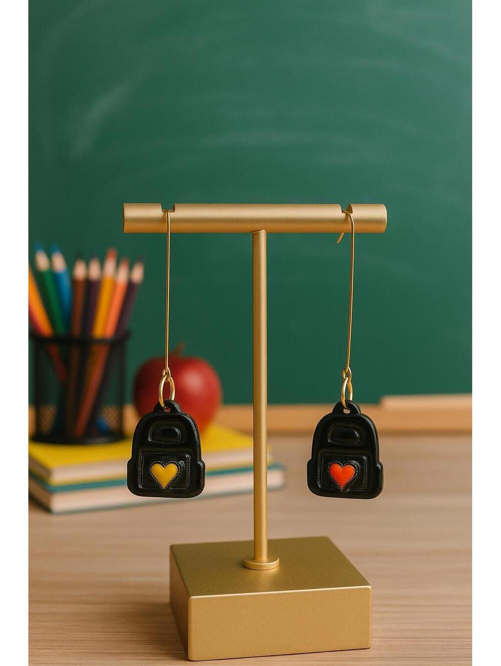 Handmade Polymer Clay Black Backpack Earrings with Yellow and Orange Heart Accen